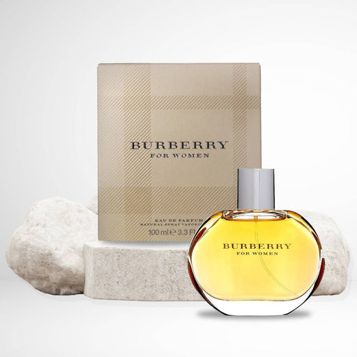 Burberry Women's Classic Eau de Parfum in signature spherical glass bottle with chrome bottle cover and amber-colored liquid