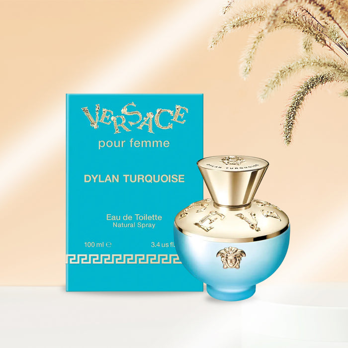Versace Dylan Turquoise rounded bottle with signature house emblem in gold; bottle cover in gold chrome finish