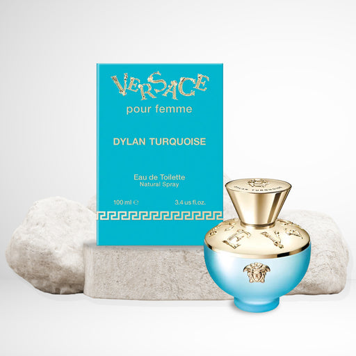 Versace Dylan Turquoise rounded bottle with signature house emblem in gold; bottle cover in gold chrome finish