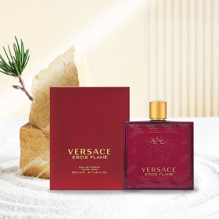 Versace Eros in texturized ruby glass bottle with gilded metallic bottle cover in chrome finish