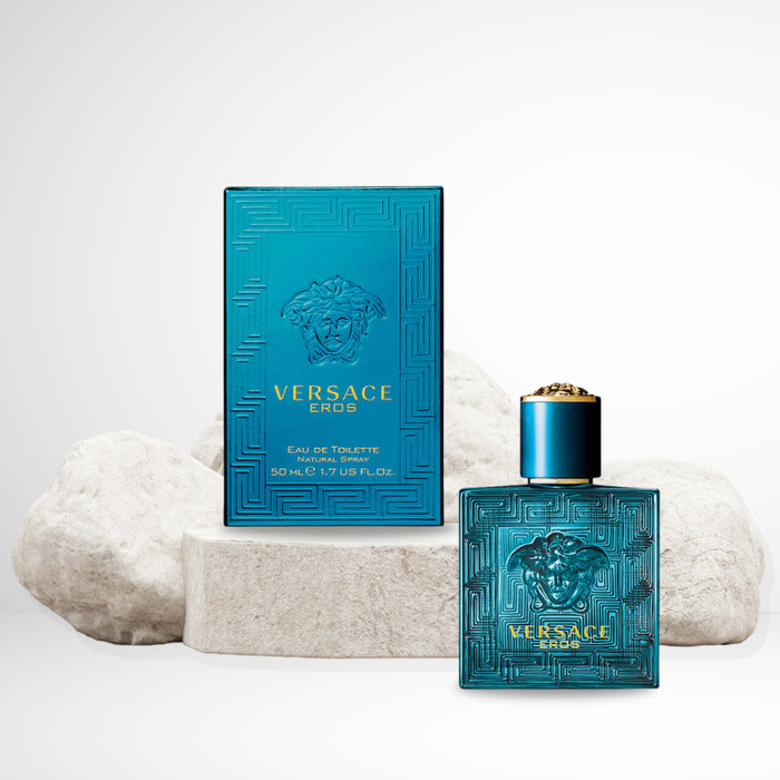 Versace Eros Eau de Toilette Spray in 1OZ square bottle with  embossed signature Versace logo in teal and gold accents